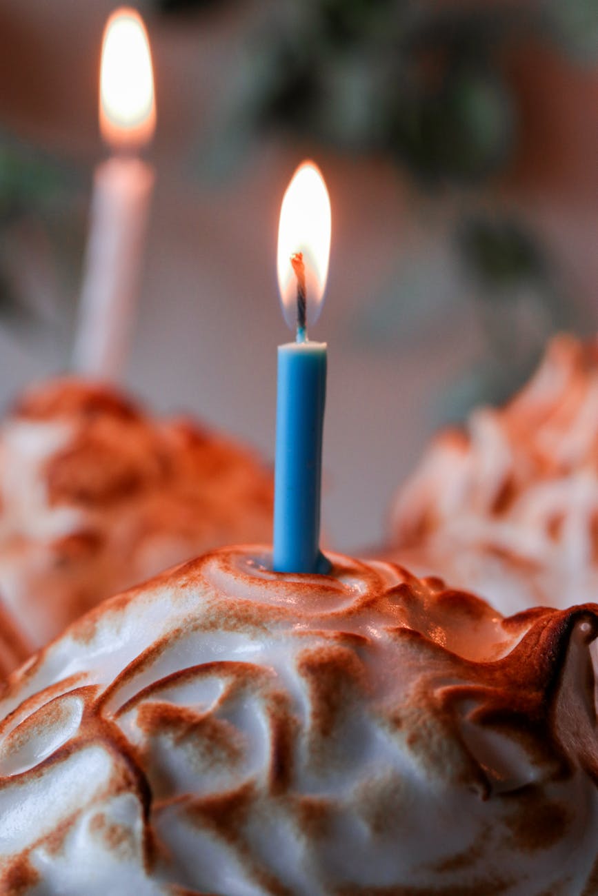 blue candle on cupcake