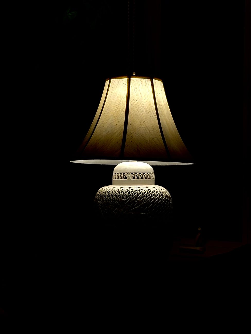elegant ceramic table lamp in dark room
